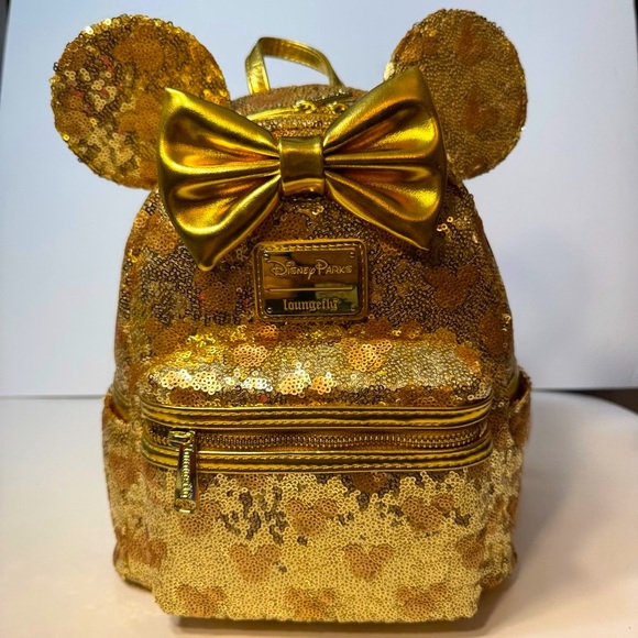 Loungefly Handbags - NWT. Disney Loungefly Minnie Mouse Gold Sequin Mini Backpack.